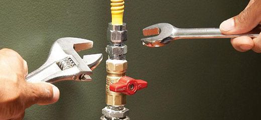 two wrenches near a gas line
